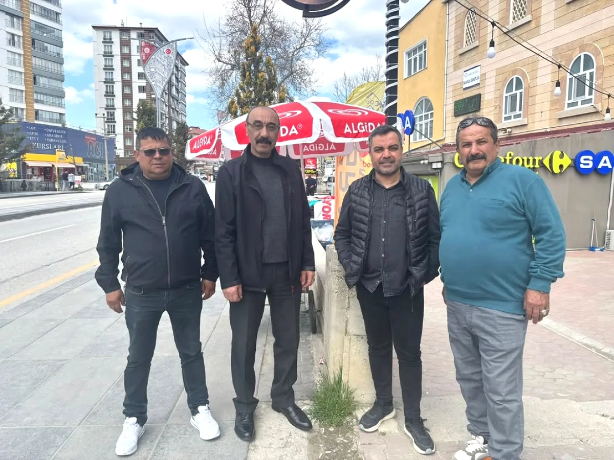 Elmadağ'da MHP'den Esnaf Ziyareti: Bahçeli'nin Selamı İletildi