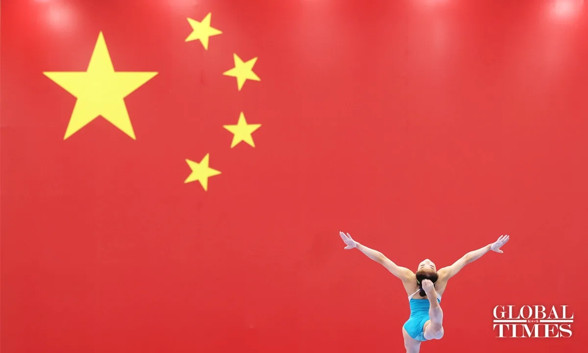 Çin Jimnastikçileri Beijing'de Açık Antrenman Yaptı Çin Jimnastikçileri Beijing'de Açık Antrenman Yaptı