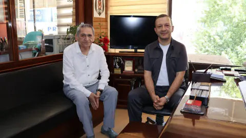 Ecz. Erol Afacan'dan Mehmet Yolyapar'a Başsağlığı Ziyareti