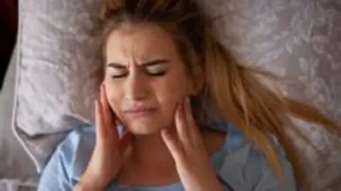 Diş sıkma salgınına uzman uyarısı: Stres ve uyku bozuklukları başlıca nedenler
