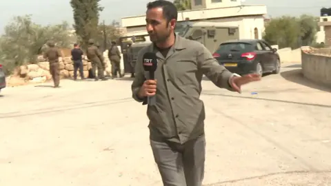 İsrail askerleri Batı Şeria'da camiyi kundakladı, TRT Haber ekibine müdahale etti
